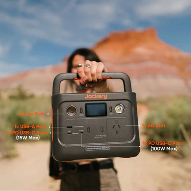 Jackery Explorer 300 Plus Portable Power Station being held by a woman.