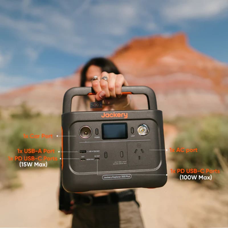 Jackery Explorer 300 Plus Portable Power Station being held by a woman.