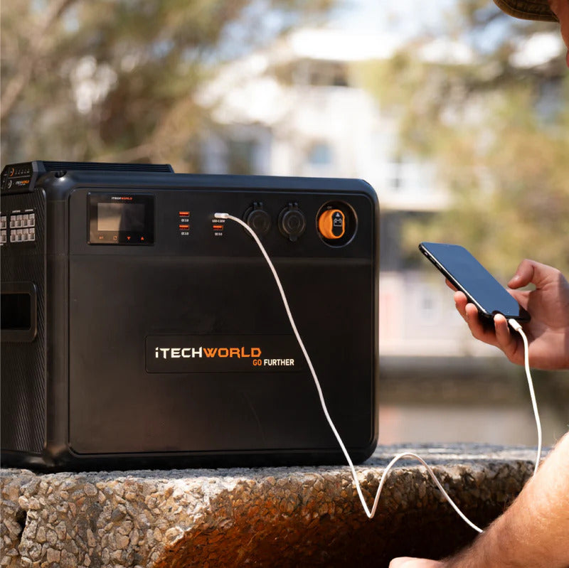 Premium GoFurther Dual Battery System with iTECHDCDC40 Battery Charger and iTECH120X PRO Lithium Battery with Bluetooth - battery kit conected to a phone.